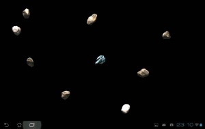 Slika 3: Prikaz vesoljske ladje z naključno razporejenimi asteroidi. Ladjo smo dodatno pomanjšali in s tem dosegli prikaz, podoben prvotni igri.
