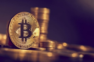 Bitcoin podrl dosedanji rekord